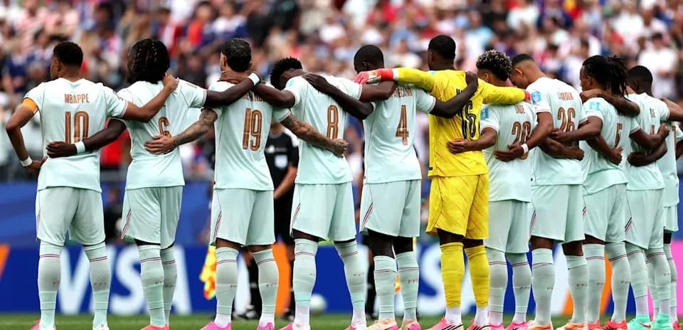 Team standing together in unity before match