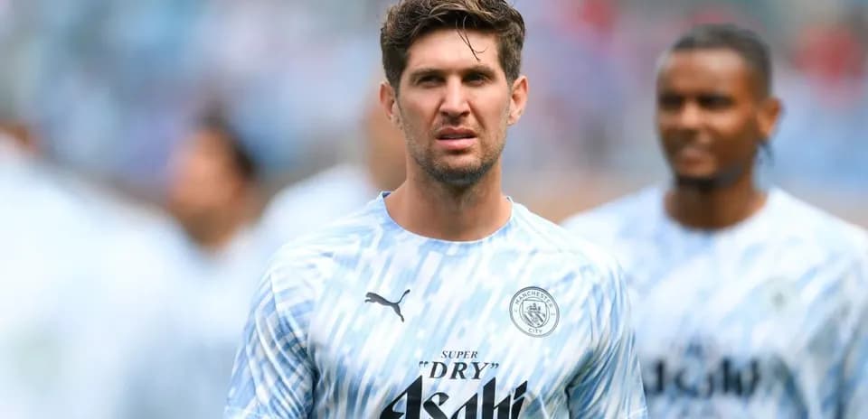 Player in Manchester City kit during warm-up