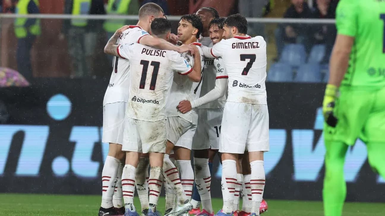AC Milan players celebrating a goal in rain