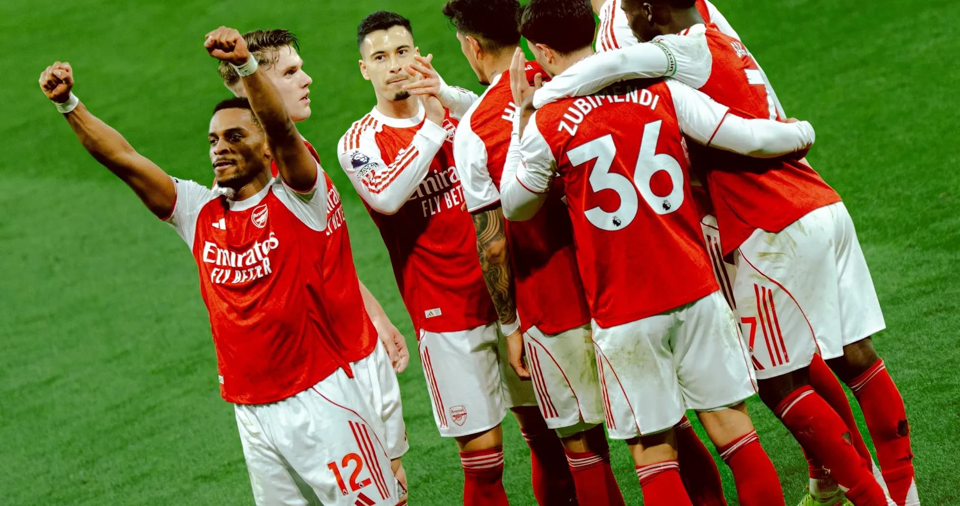 Arsenal players celebrating a goal during match