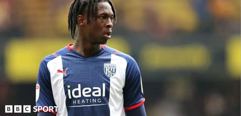 Player wearing West Bromwich Albion kit on field