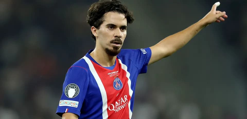 Player gesturing during match in PSG jersey