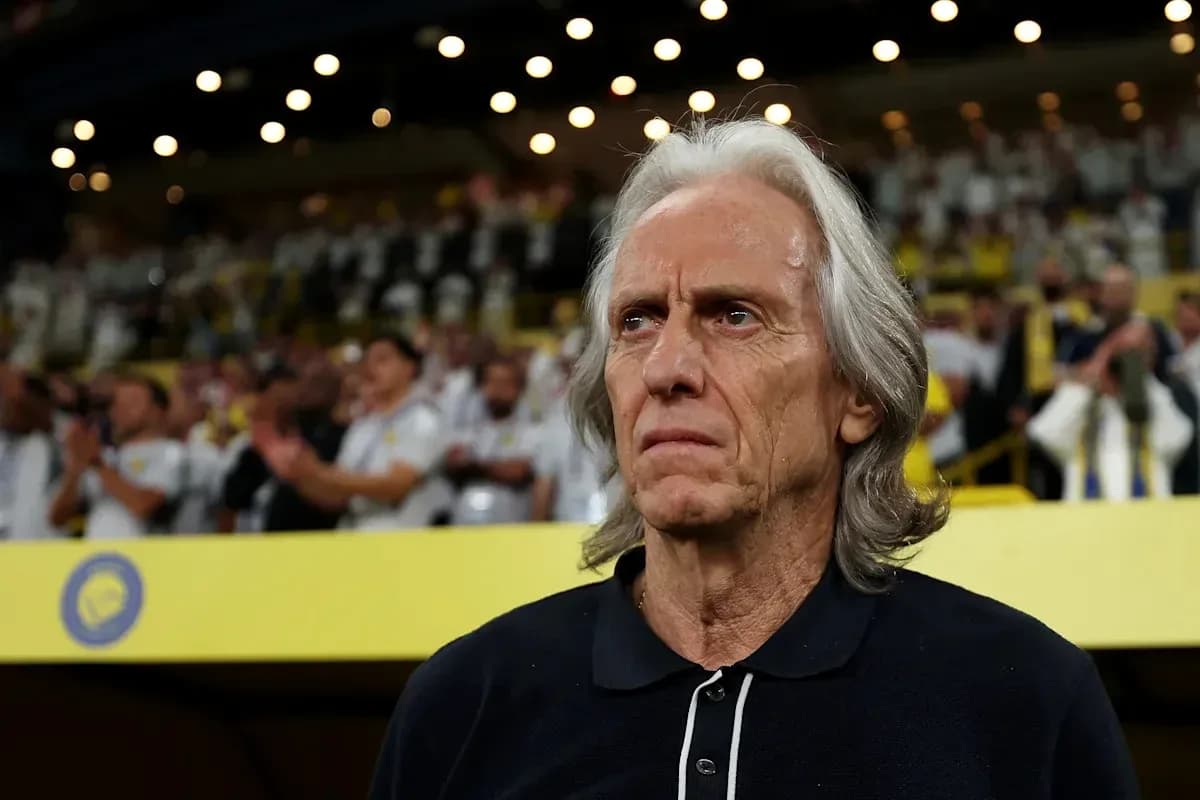 Coach observing fans during a match in stadium
