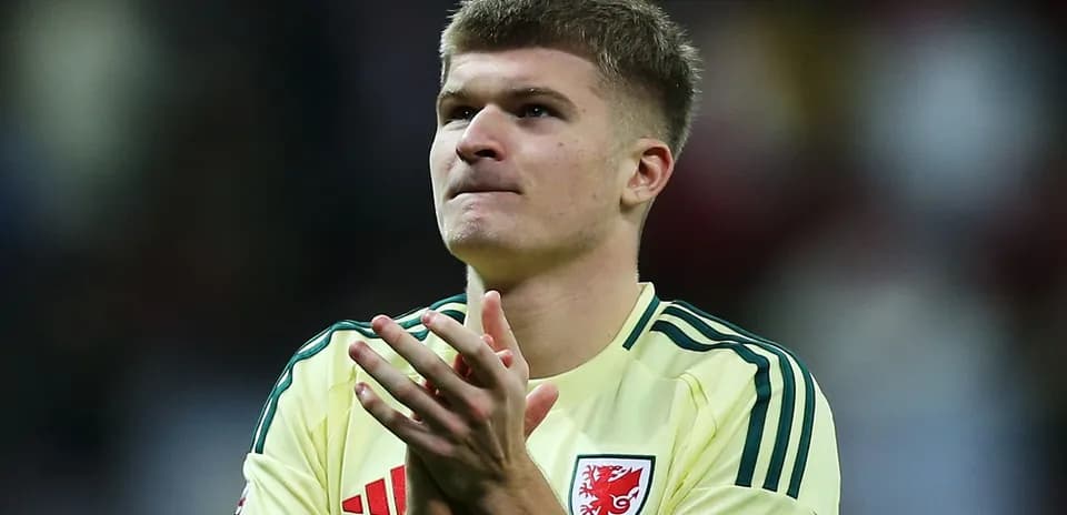 Player applauding fans after a match