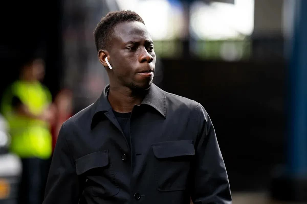 Player walking with AirPods in urban setting