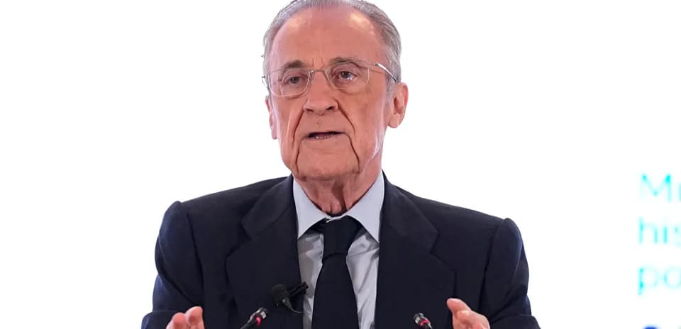 Man speaking at podium during a conference