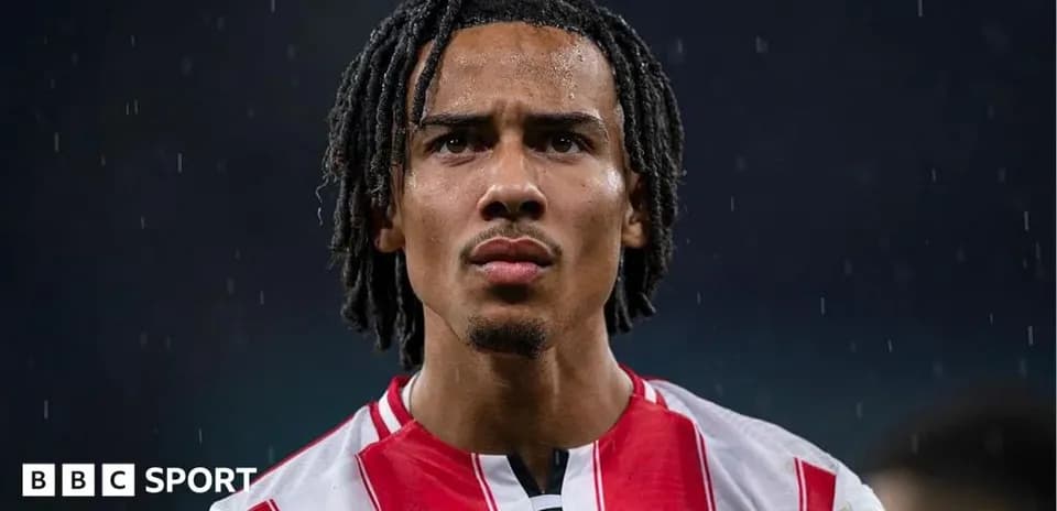 Brentford player looking serious in rain