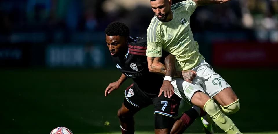 Players competing for the ball in MLS Next Pro