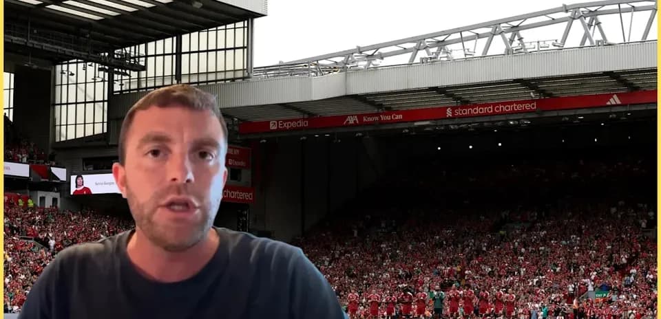 Presenter speaking with Liverpool team in background