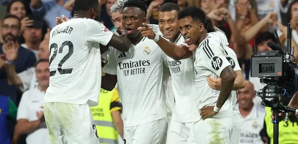Real Madrid players celebrating a goal