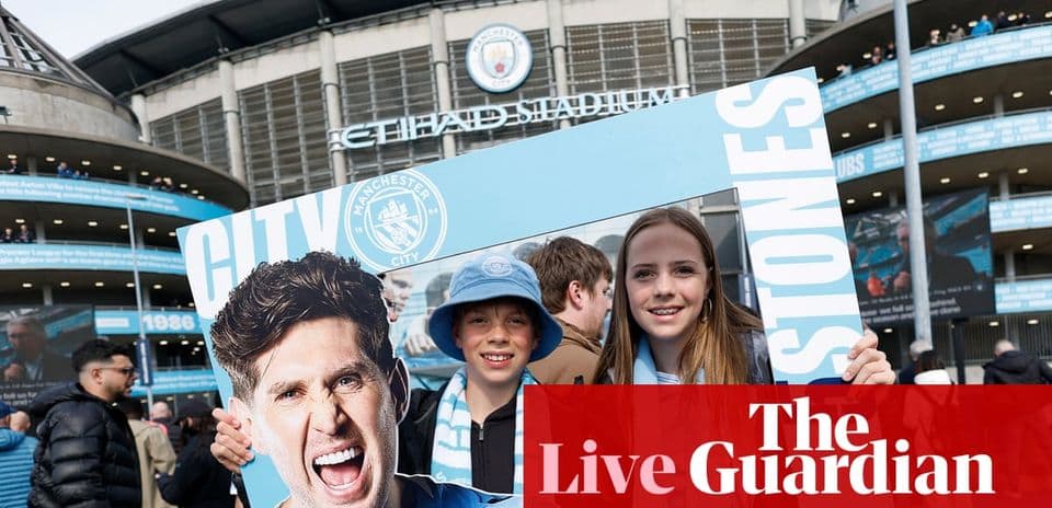 Fans holding a sign outside Etihad Stadium