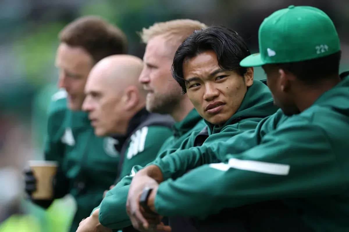 Players sitting on bench during a match