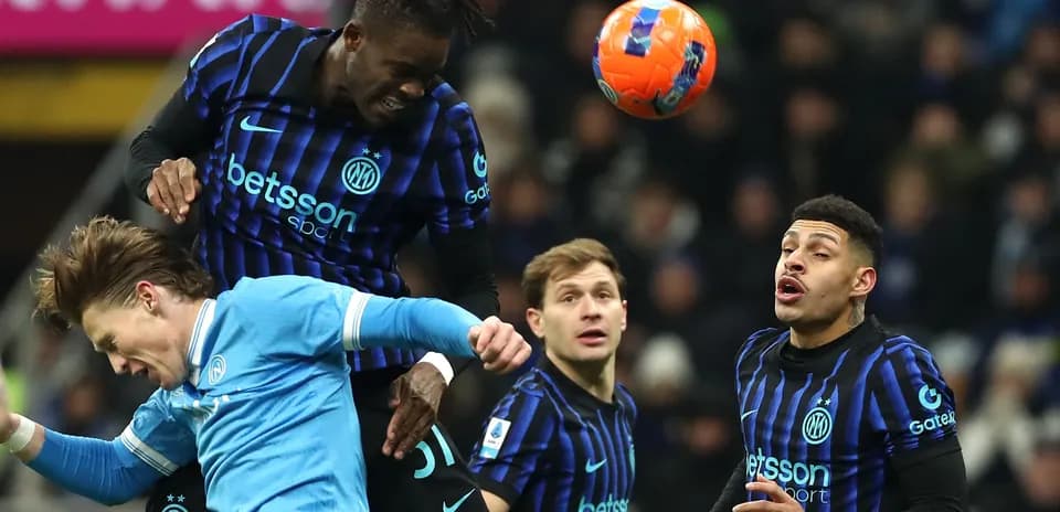 Players contesting for the ball during a match