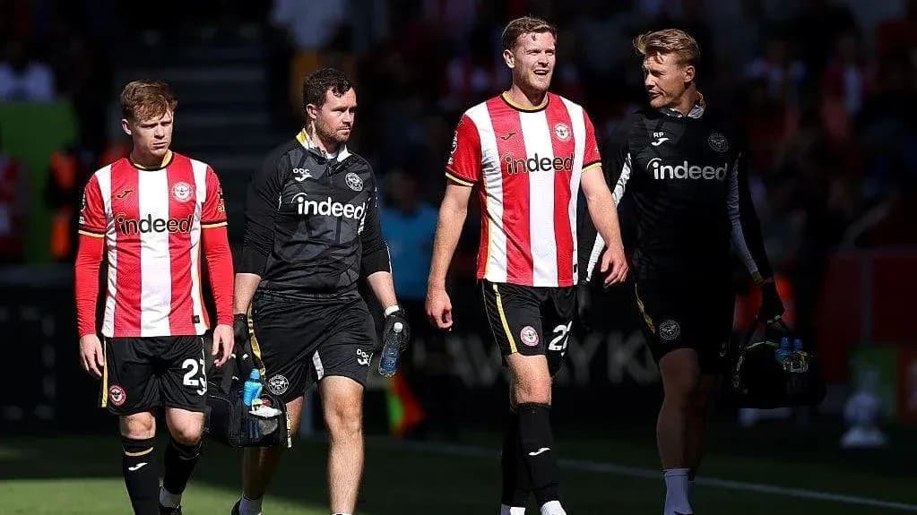 Brentford players walking off the pitch after match Brentford players walking off the pitch after match