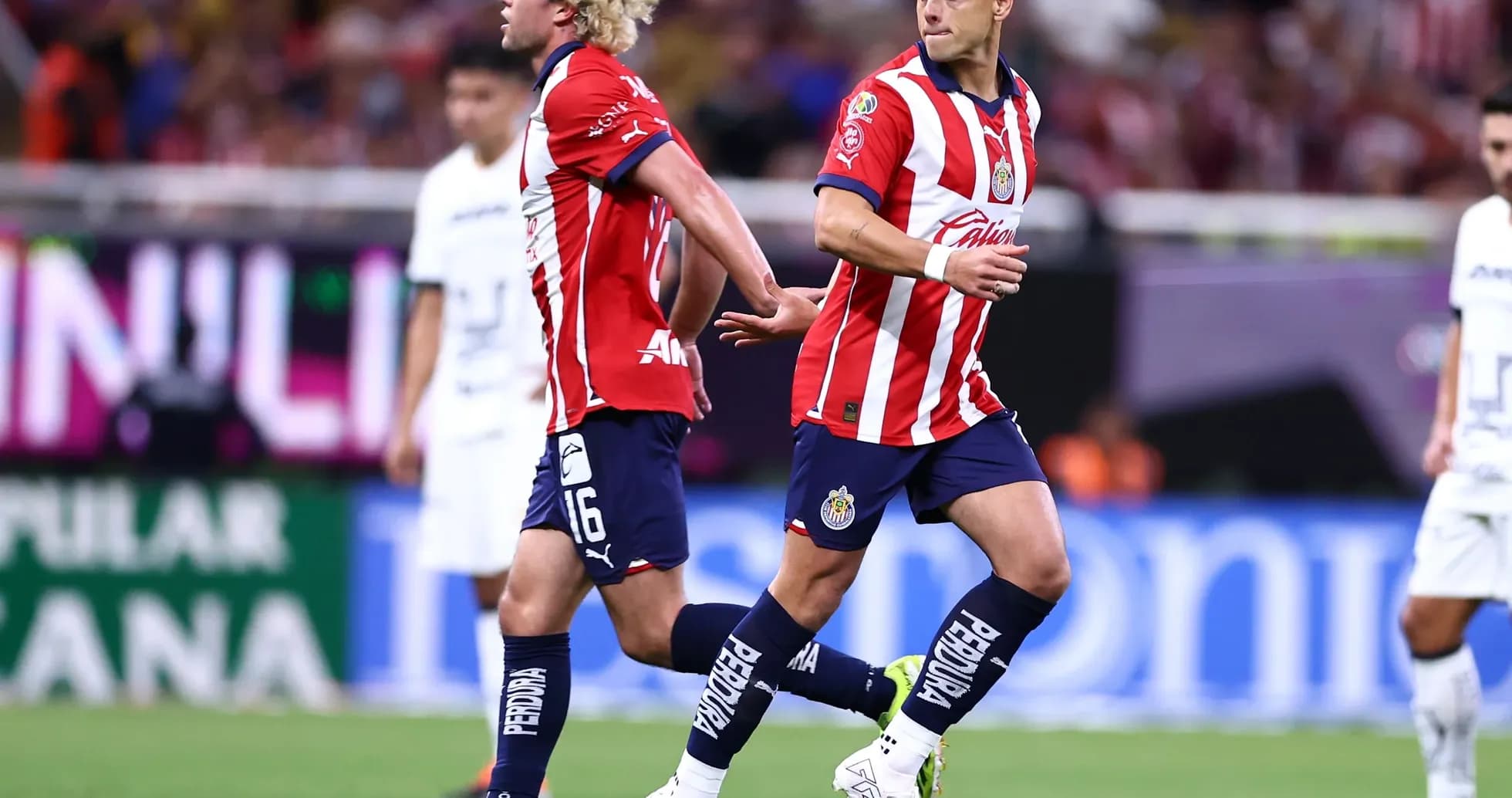 Guadalajara Chivas players celebrating during match