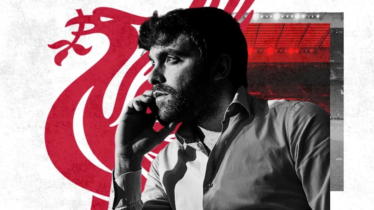 Person on phone with Liverpool logo background
