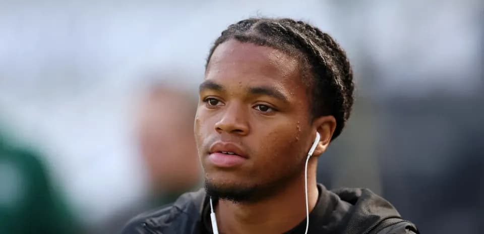 Player wearing earphones before a match