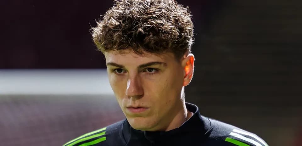 Player in training gear looking focused before match