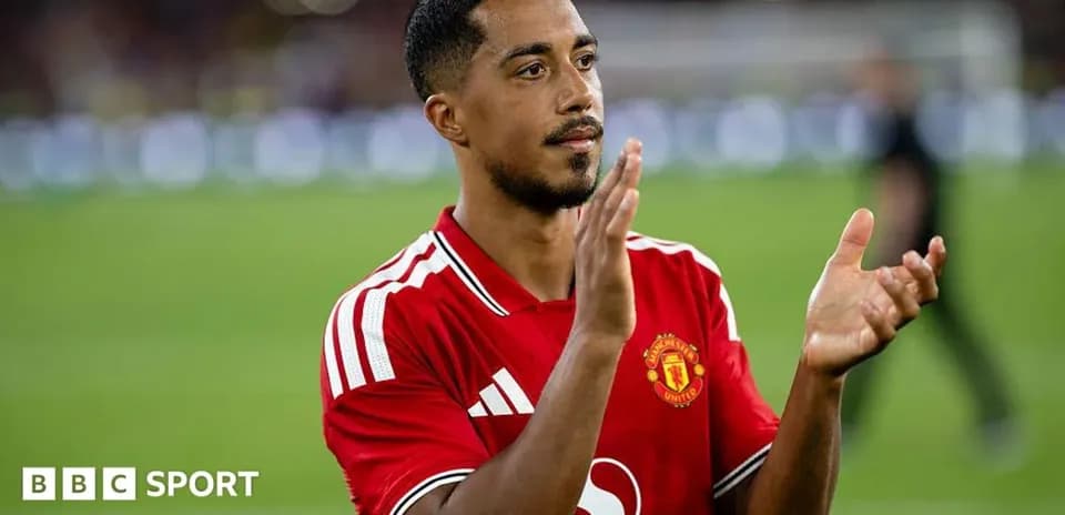 Player applauding fans after match at stadium