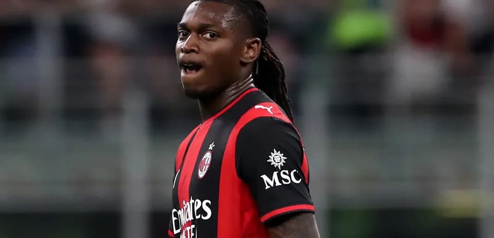 Player wearing AC Milan kit during match