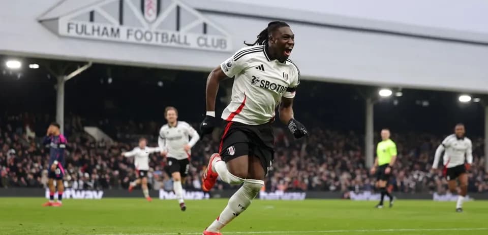 Fulham player celebrating a goal at Craven Cottage
