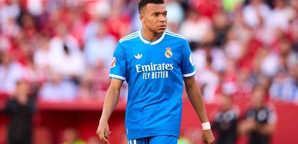 Player in blue Real Madrid kit during match
