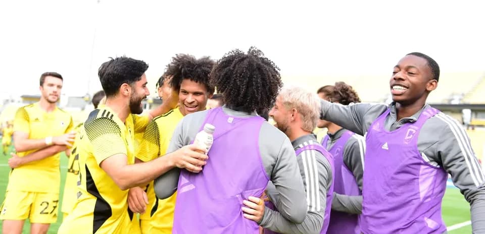 Columbus Crew II players celebrating on the field