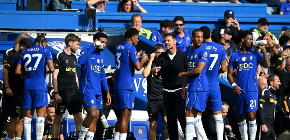 Chelsea players and coach during match warm-up