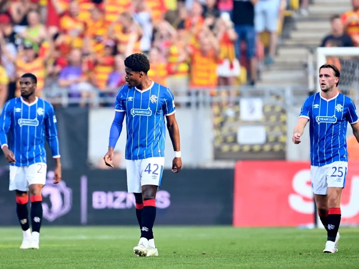 Rangers players walking on the field during match