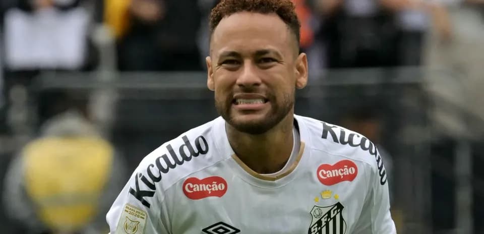 Neymar celebrating after scoring a goal for Santos