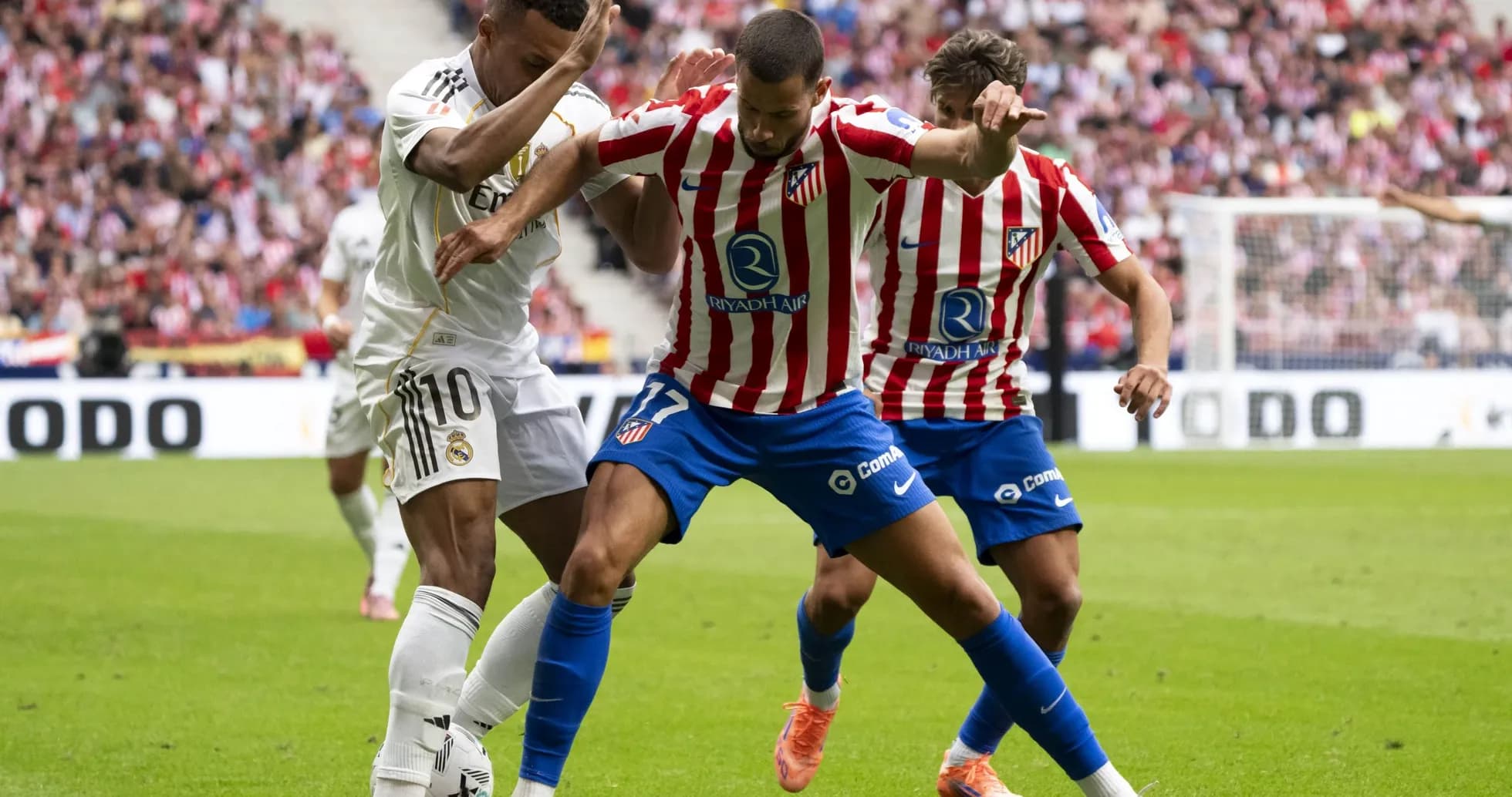 Real Madrid and Atletico Madrid players in action