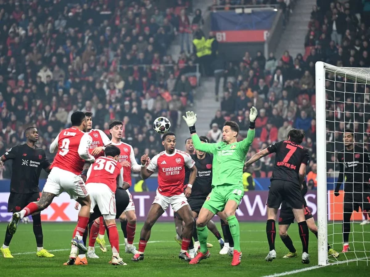 Players contesting a corner kick during match