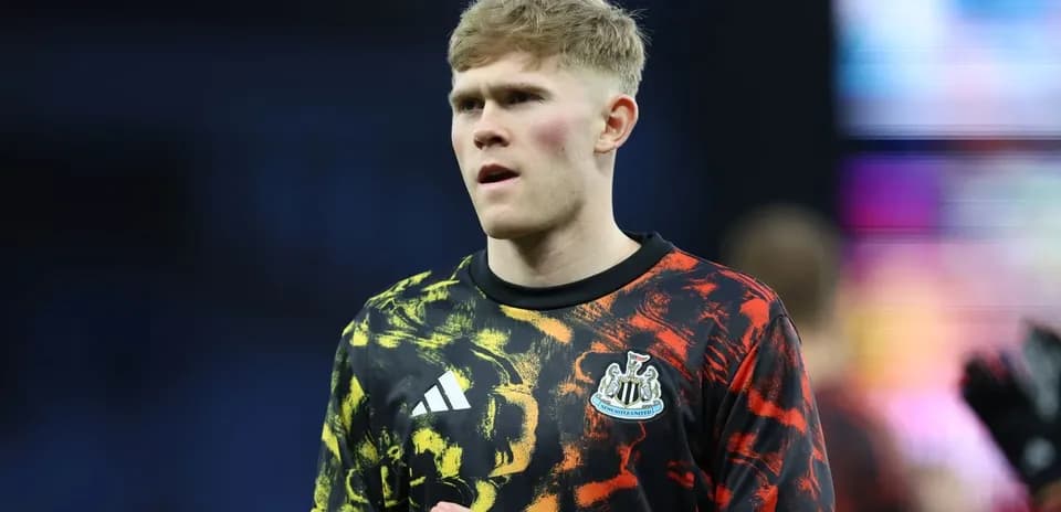 Goalkeeper in colorful warm-up shirt before match