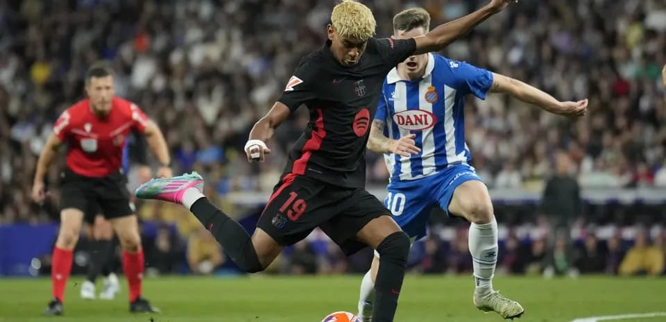 Player from Barcelona shooting during match against Espanyol