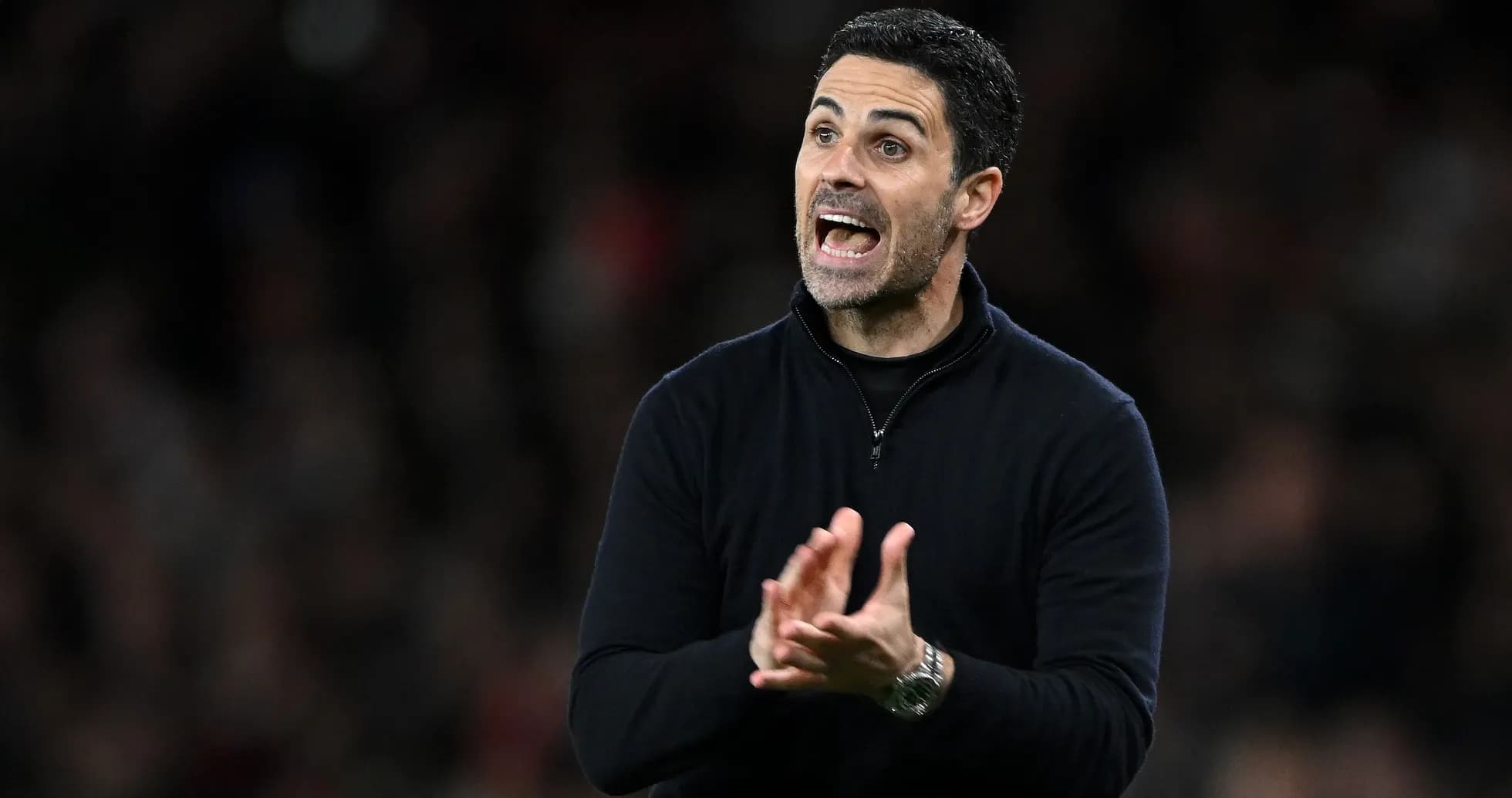 Manager gesturing during a football match