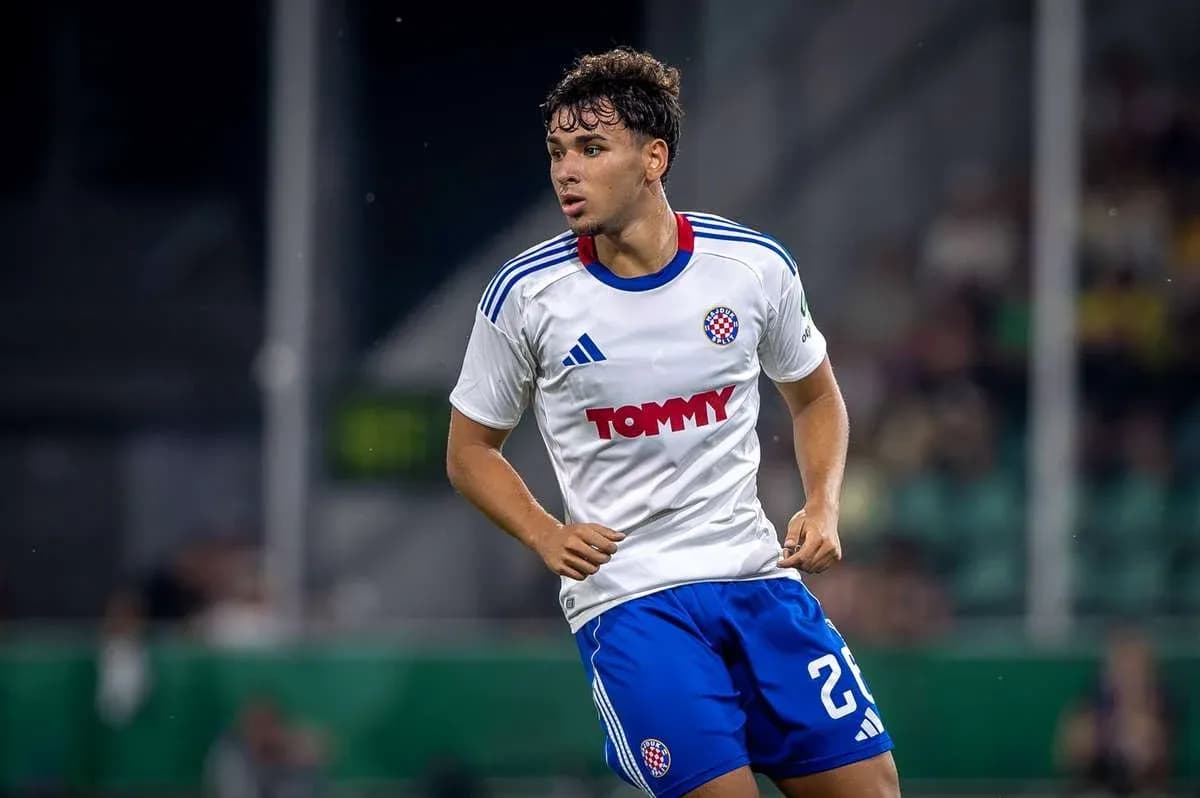 Player in white and blue kit during match