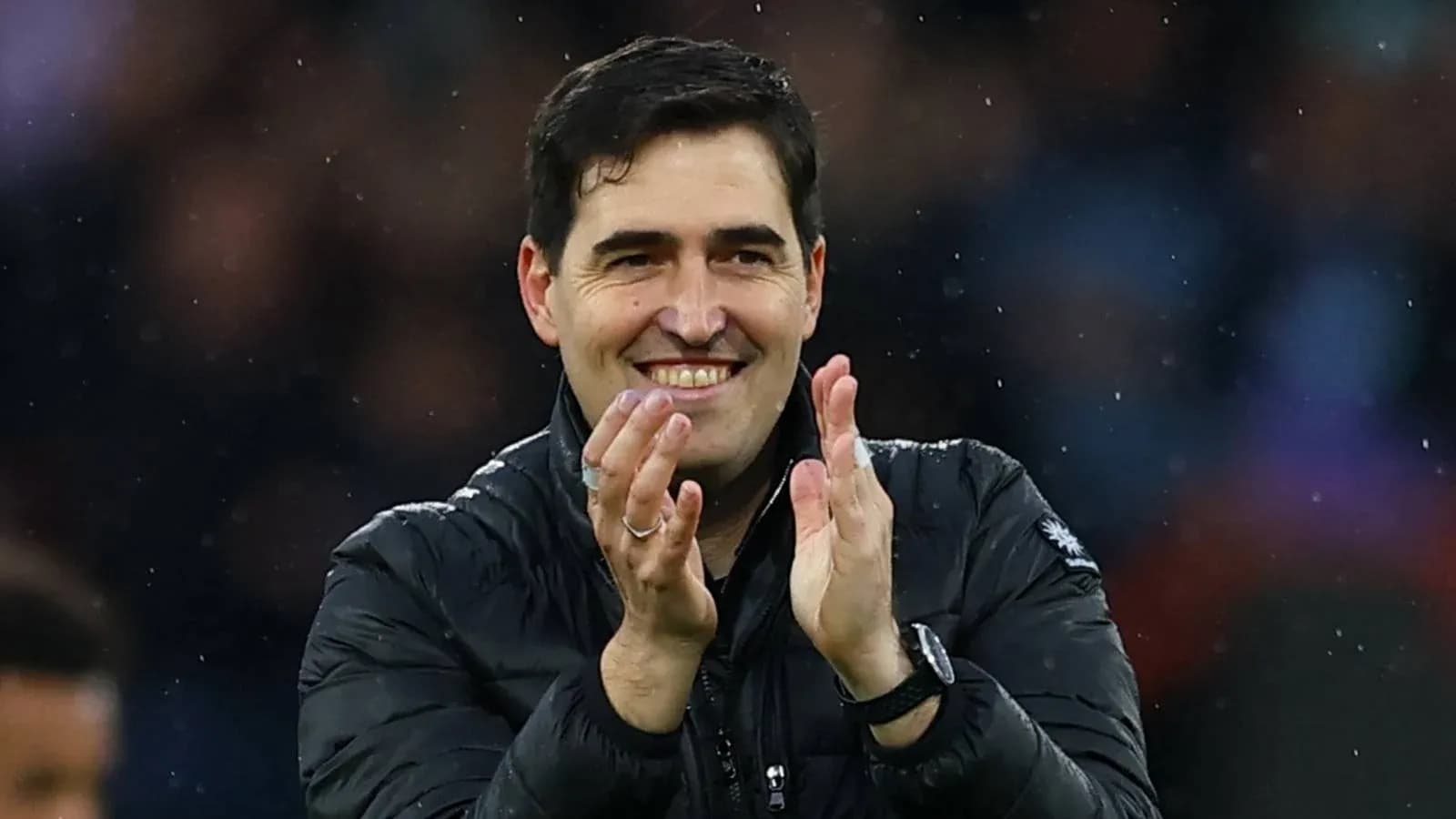 Manager applauding during a match celebration