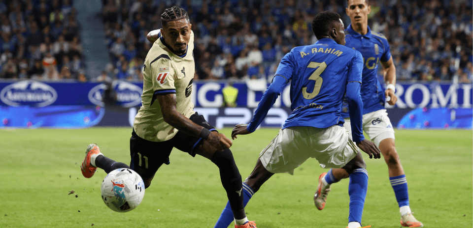 Player tackling during Oviedo vs Alaves match