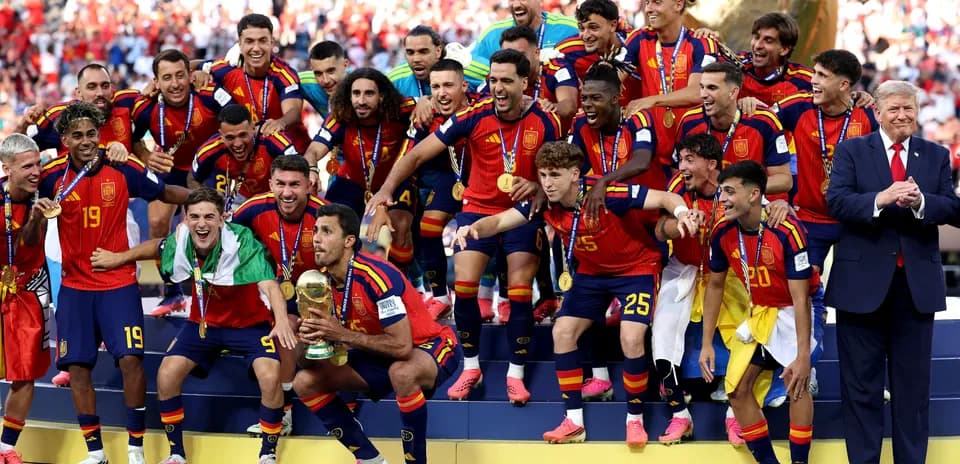 Spain national team celebrating World Cup victory on stage