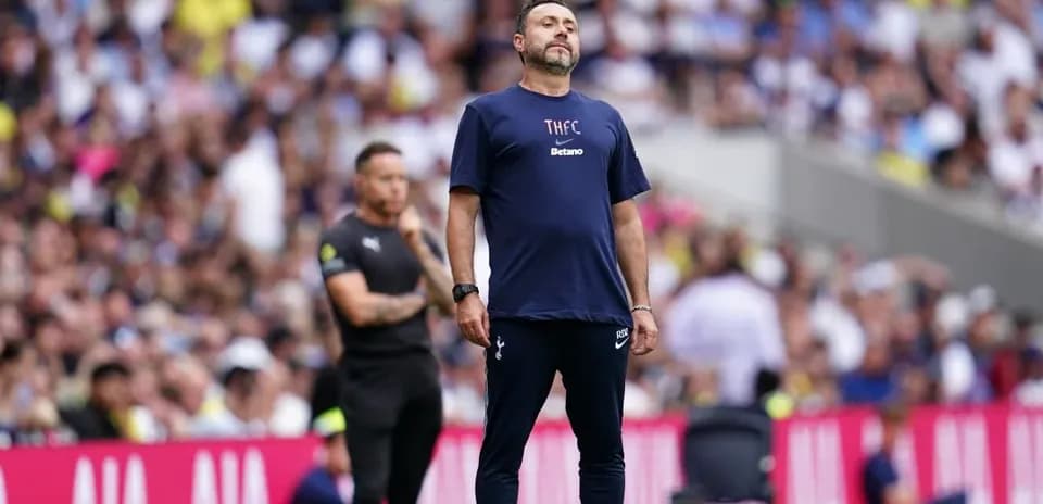 Manager observing match on the sideline