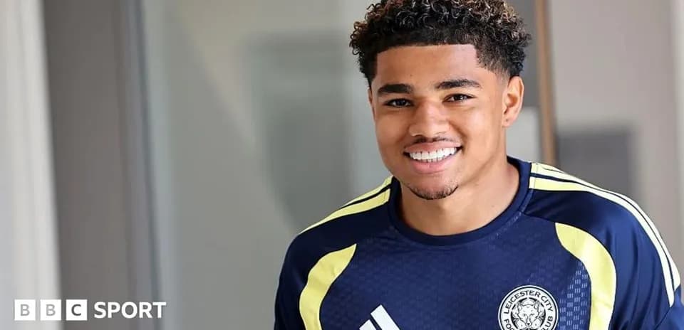 Player smiling in Leicester City training kit