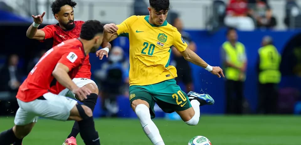 Player kicking ball during Australia vs Egypt match