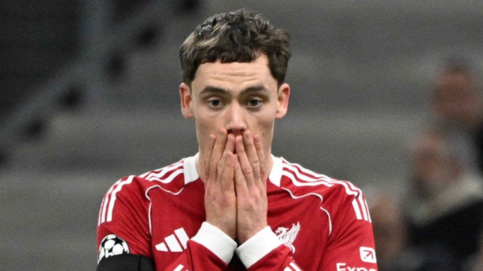 Player with hands on face during match
