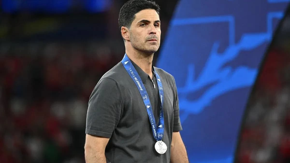 Manager wearing a silver medal at final event