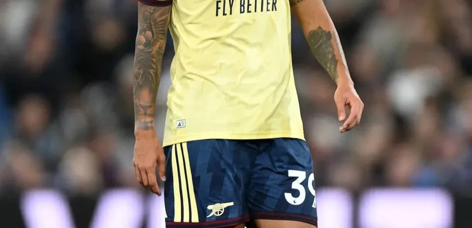 Player in Arsenal kit during match on field