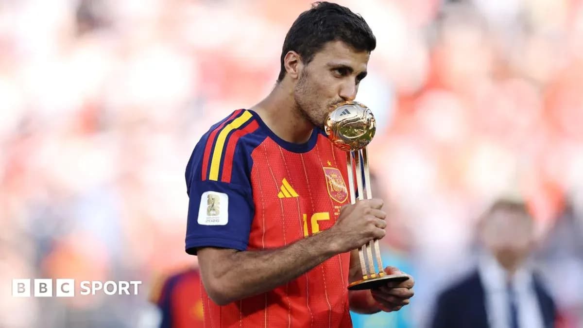 Player kissing trophy during victory celebration