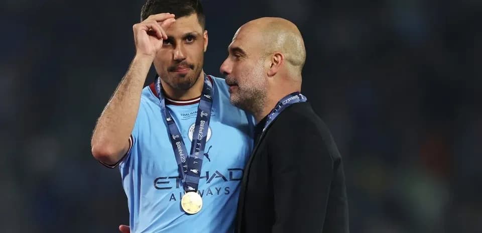 Player and coach celebrating victory with medals