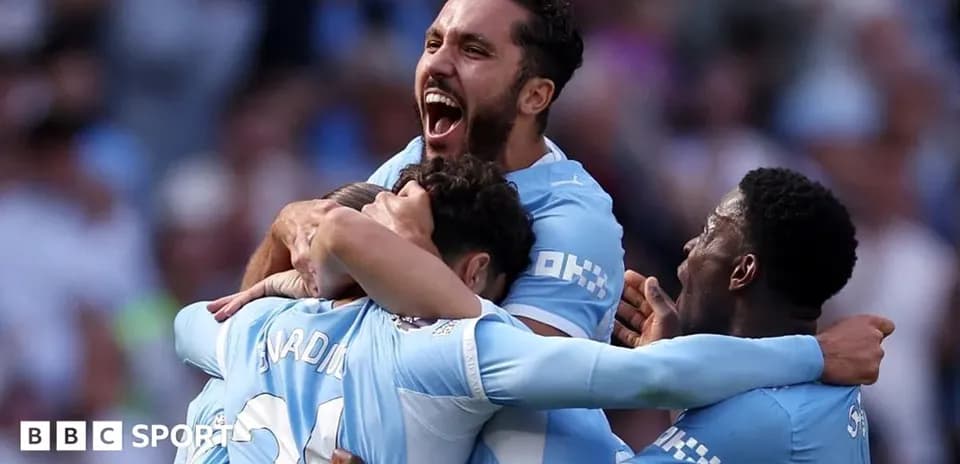 Players celebrating a goal during a match