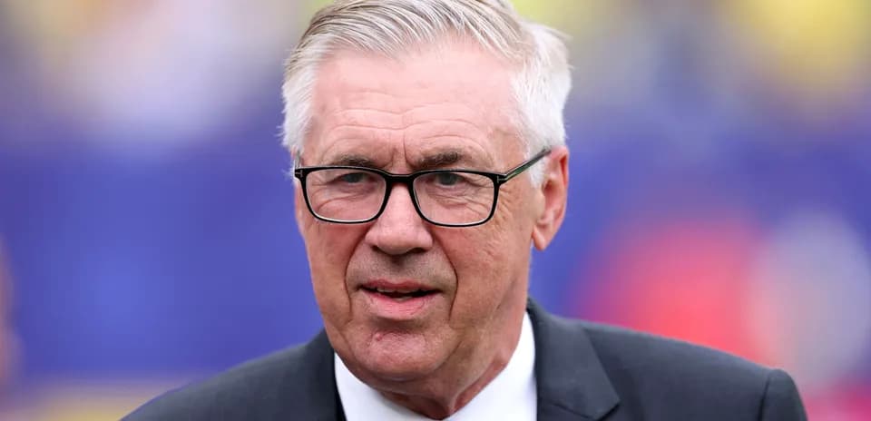 Coach wearing glasses at a sports event