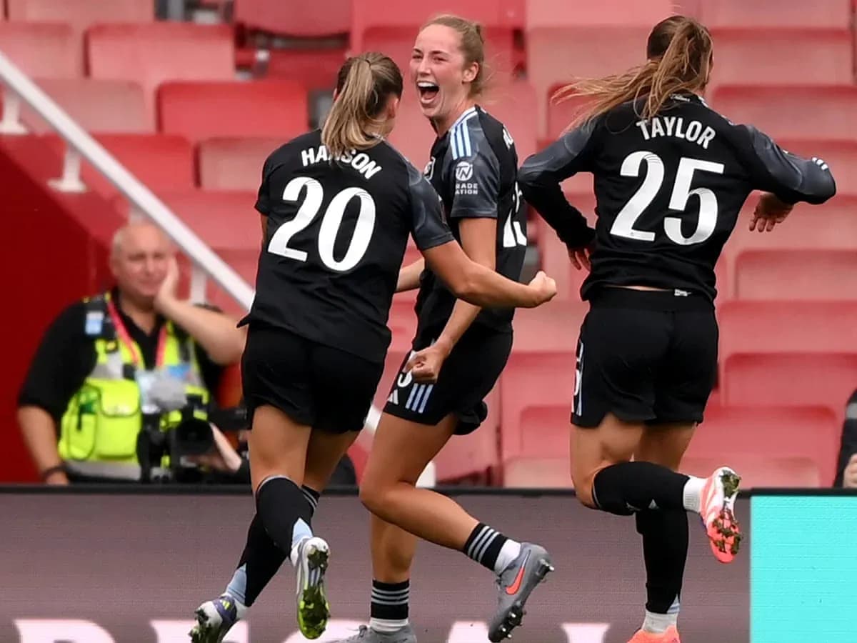 Players celebrating a goal during FA WSL match